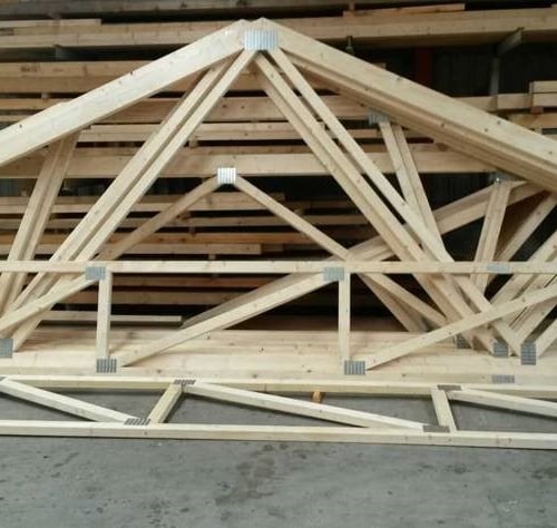 Wooden building materials connected with metal nail plates